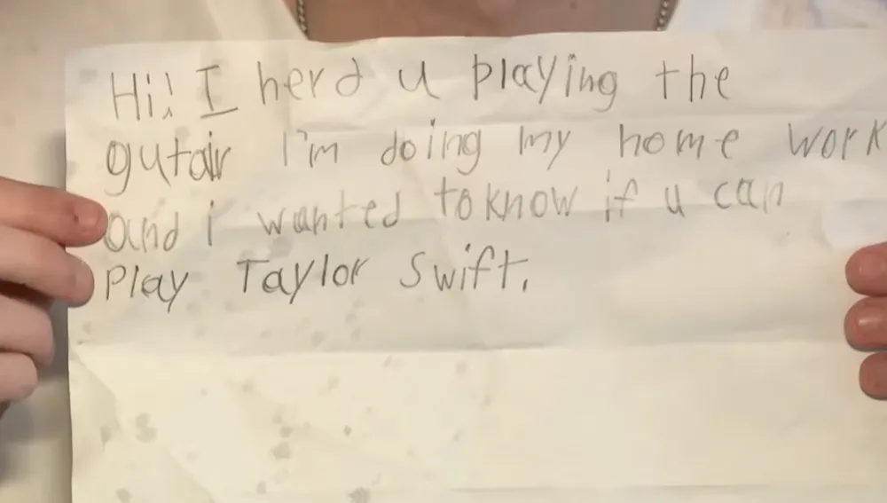 neighbor plays guitar for little girl