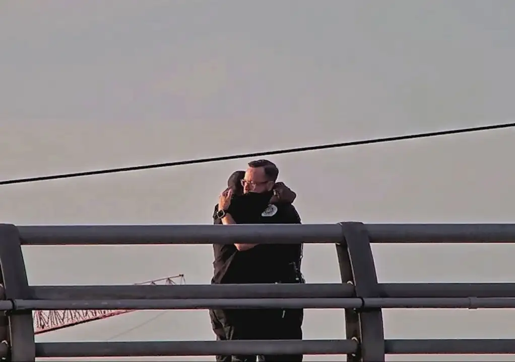 police officer saves man bridge suicide